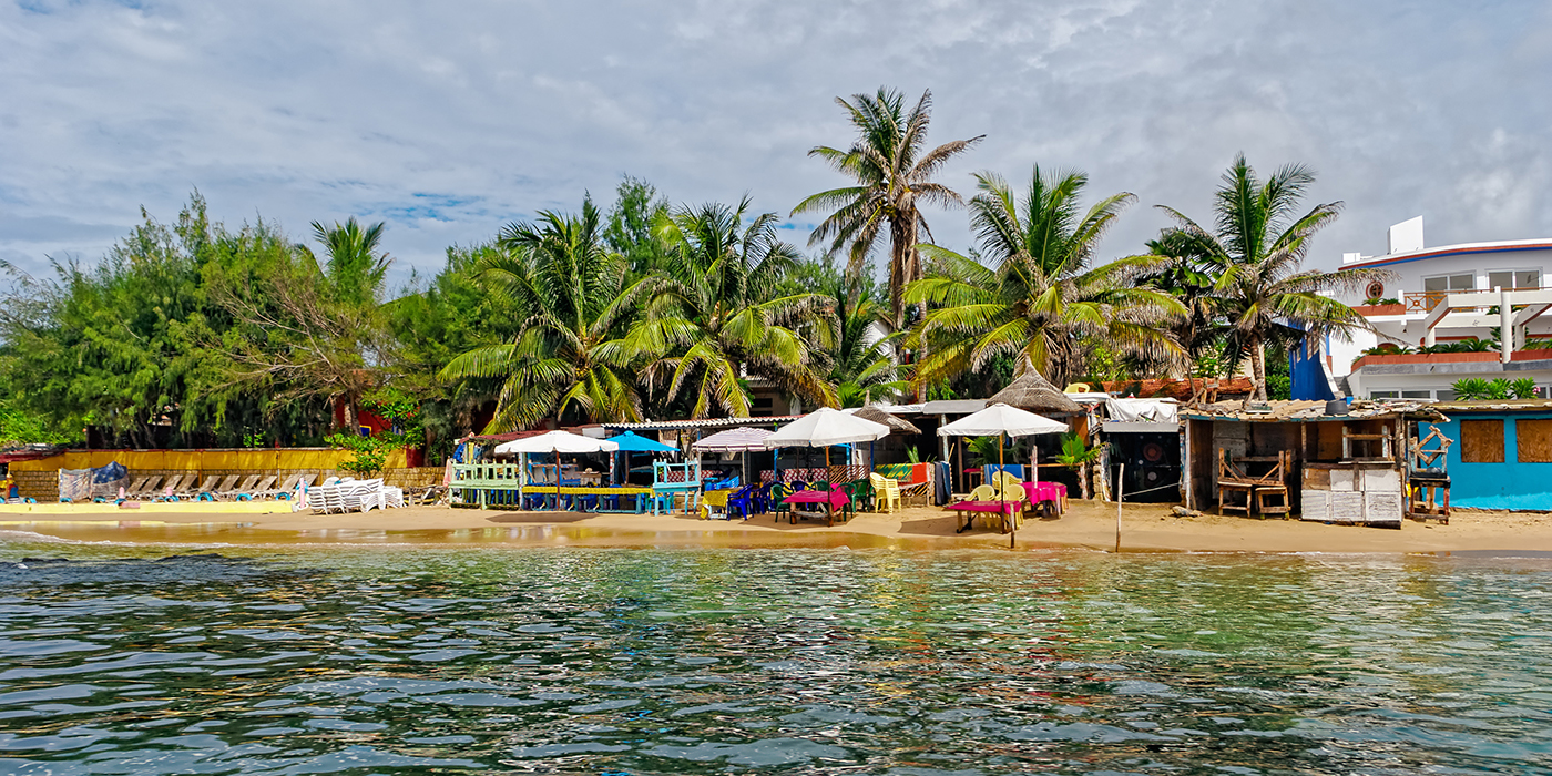 Shore of tiny island of NGor in Atlantic ocean